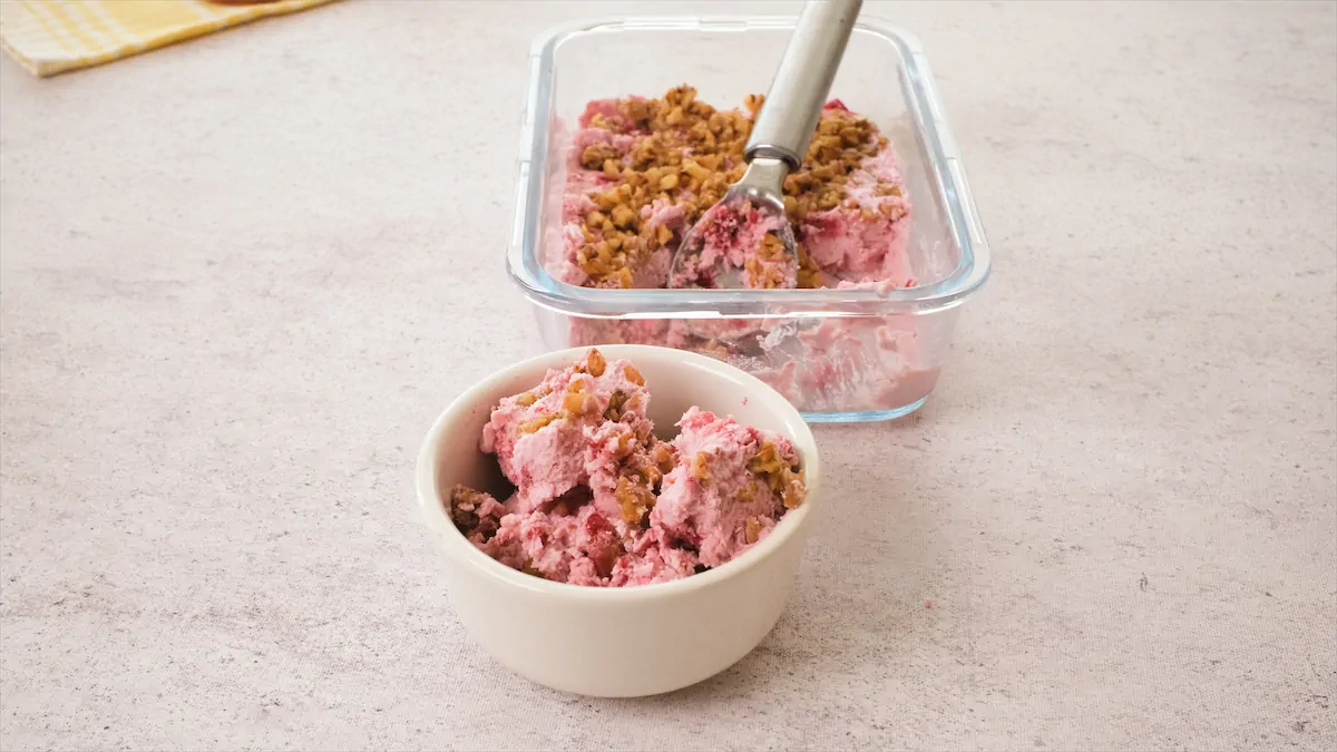 Cottage cheese ice cream served in a small bowl from a freezer safe container.