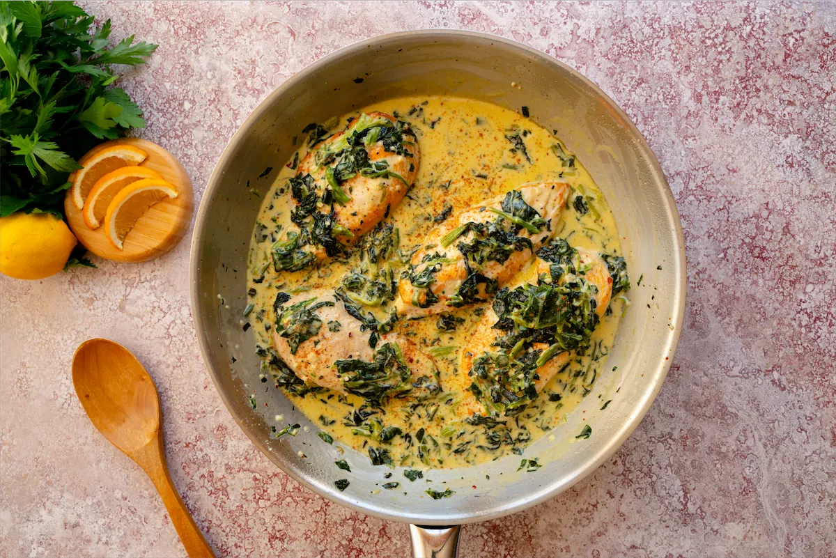 Low-carb chicken Florentine prepared in a stainless steel pan, all set for serving.
