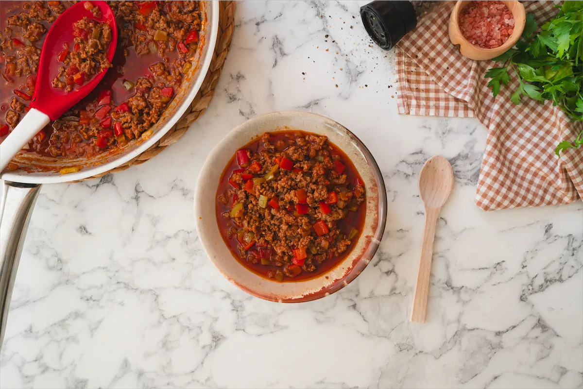 Low-carb keto chili con carne served in a bowl, directly from the skillet.