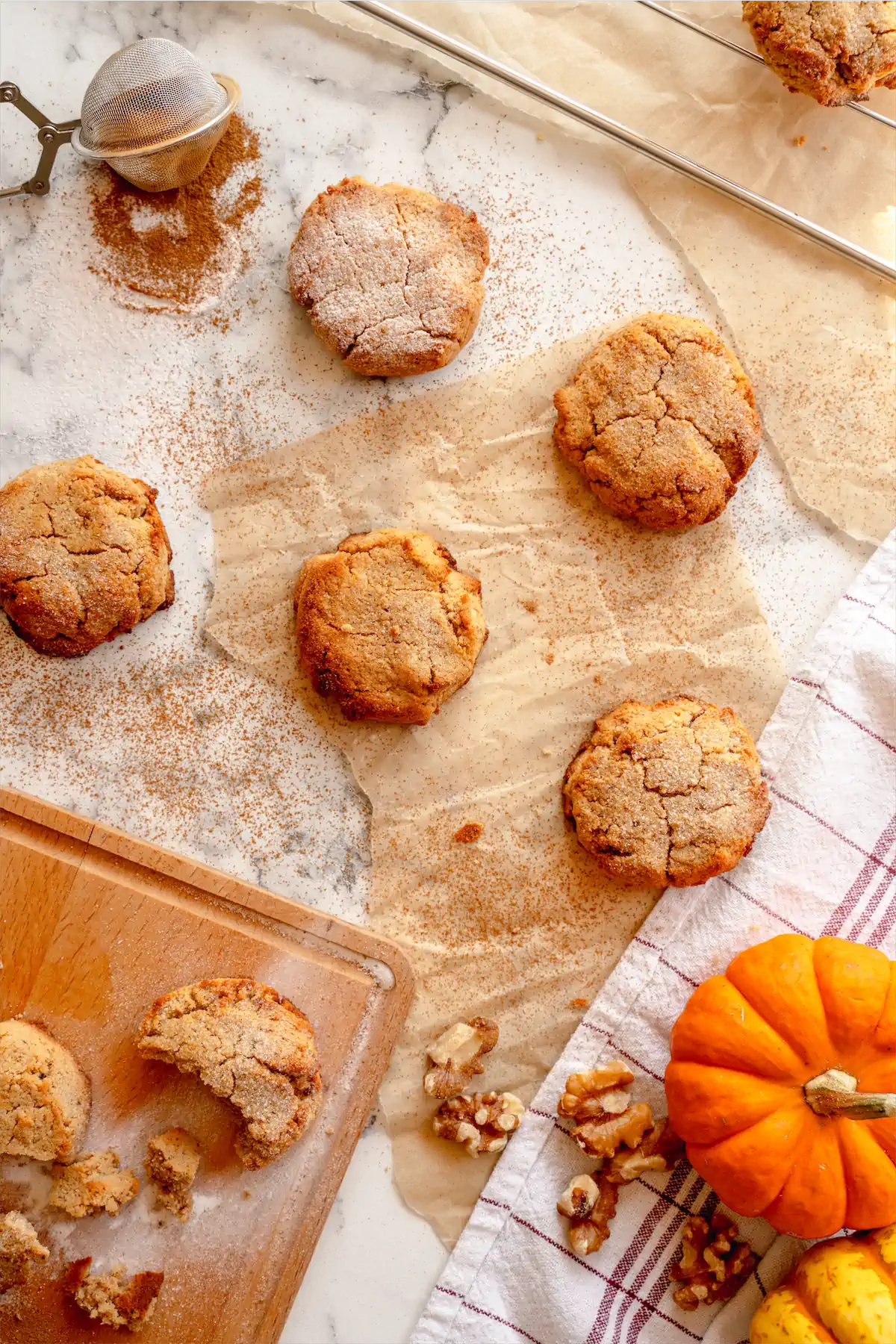 Homemade keto pumpkin spice cookies artfully presented on the table.