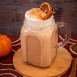 Keto pumpkin spice latte recipe with almond milk served in a mason jar.