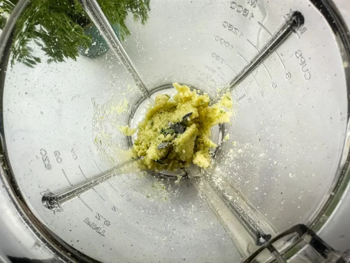 Pesto sauce ready to be transferred in a bowl.