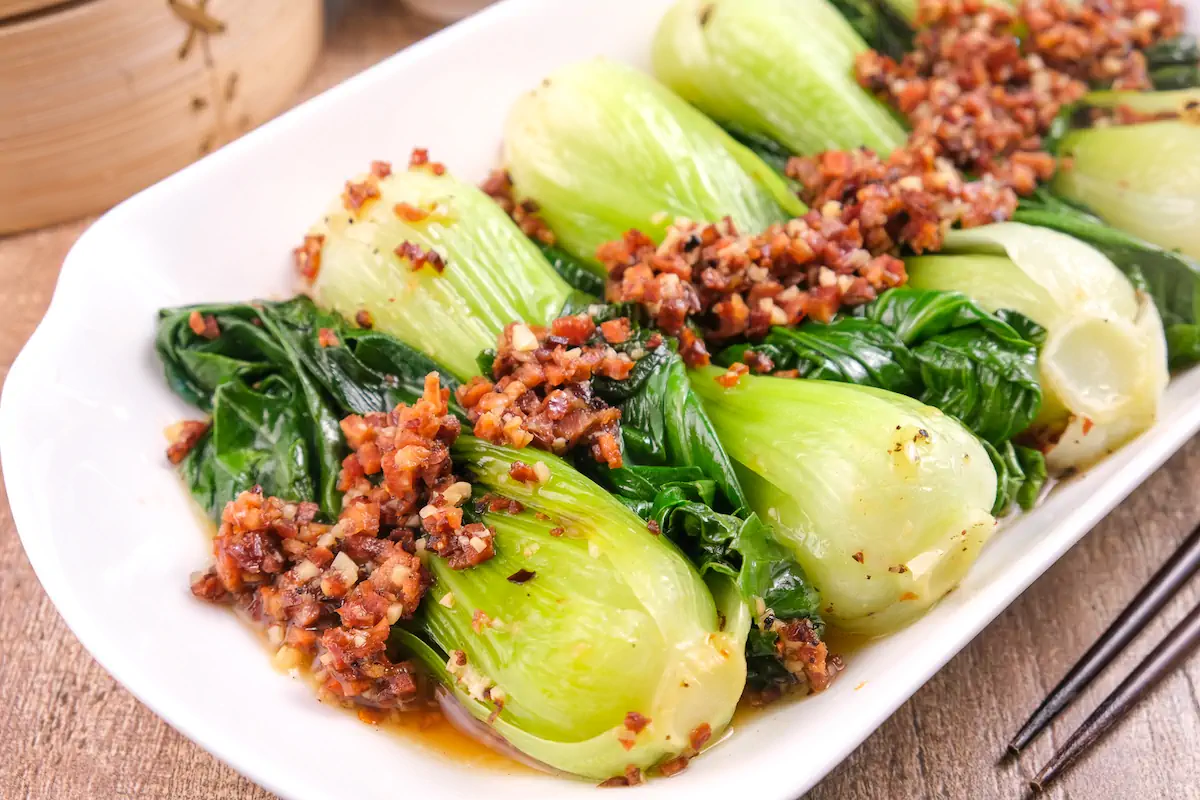 Homemade chorizo and Chinese keto bok choy on a serving tray.