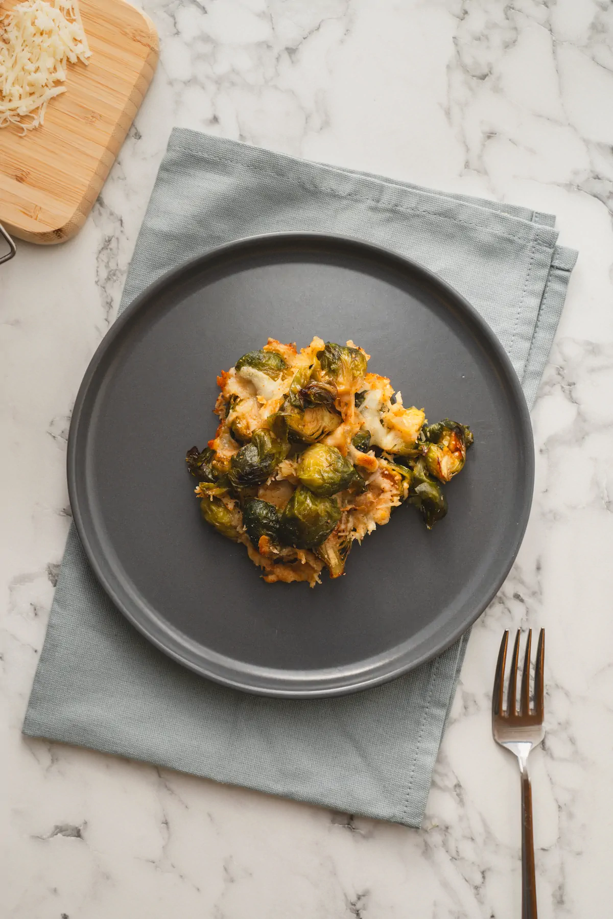 Keto-friendly Brussels sprouts casserole served on a plate.
