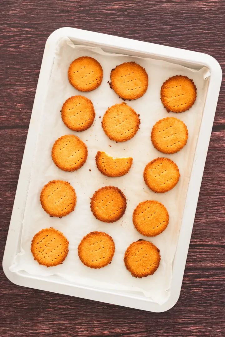Homemade almond flour shortbread cookies on a white tray.