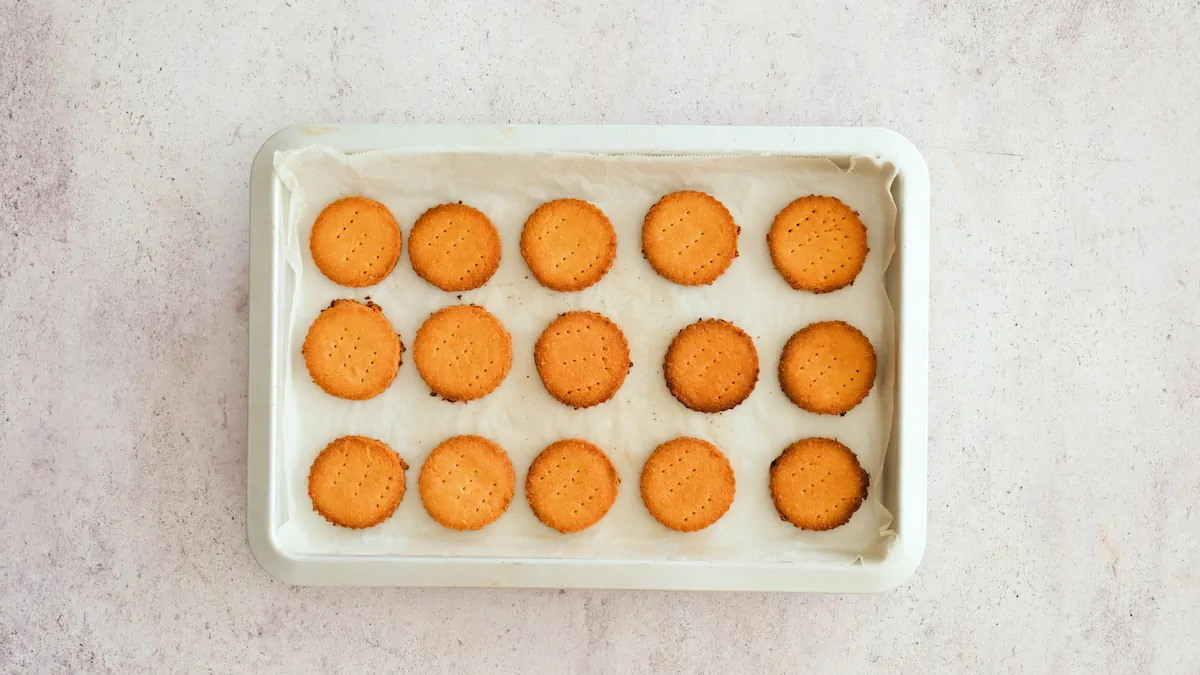 Freshly baked almond flour cookies on a tray.