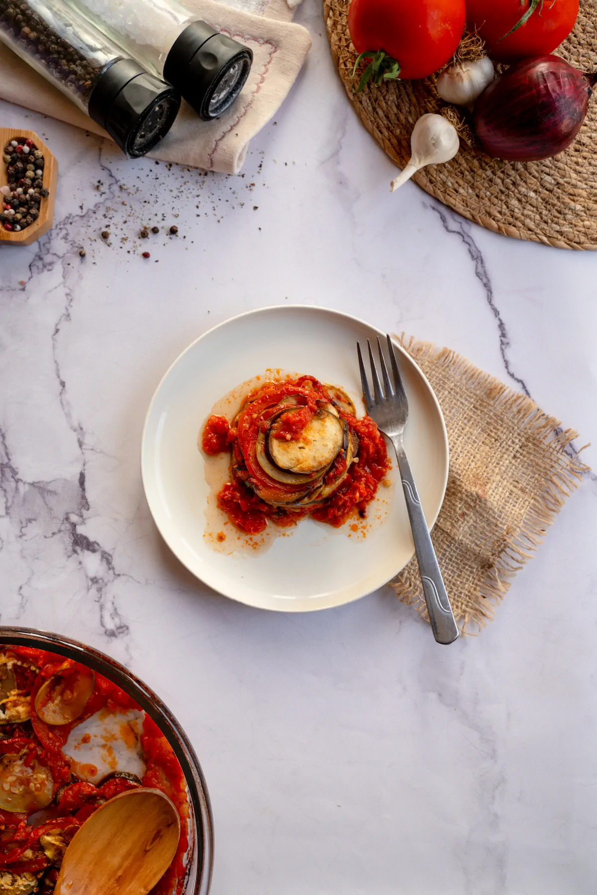 Keto ratatouille presented on a plate with a fork.