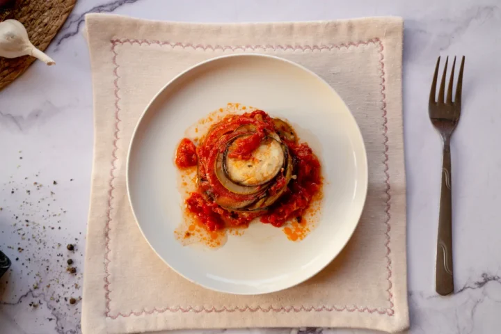 Keto ratatouille served on a plate with a fork.