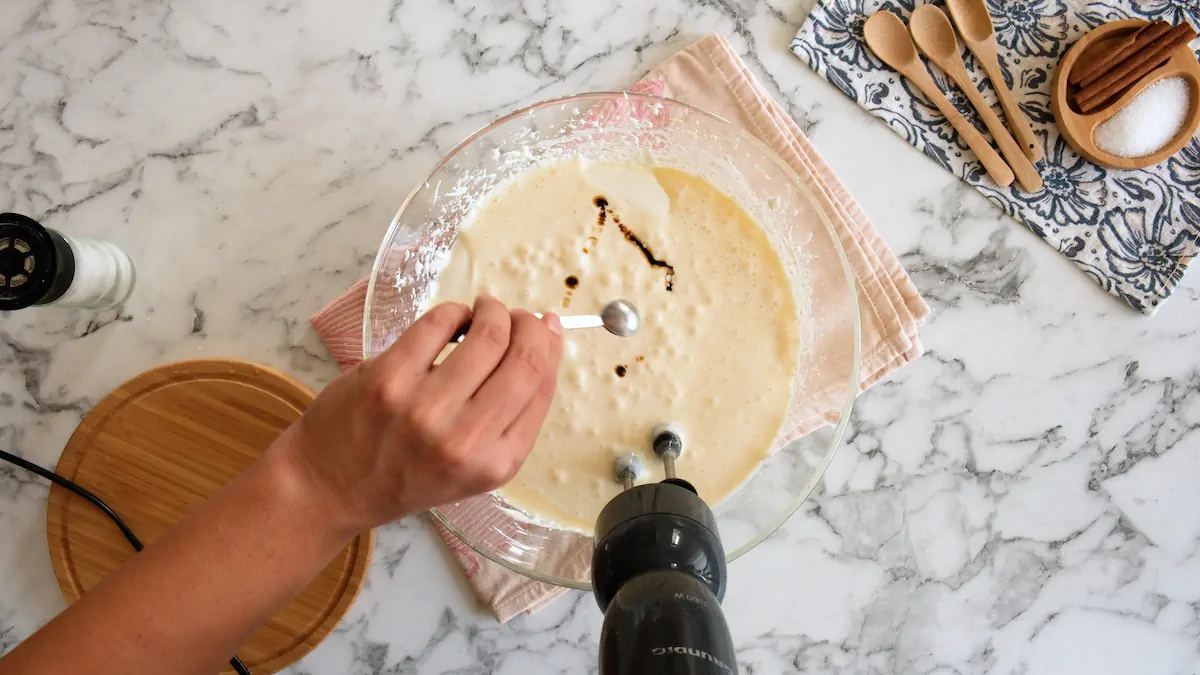 Adding vanilla extra to the cream cheese and heavy cream mixture.