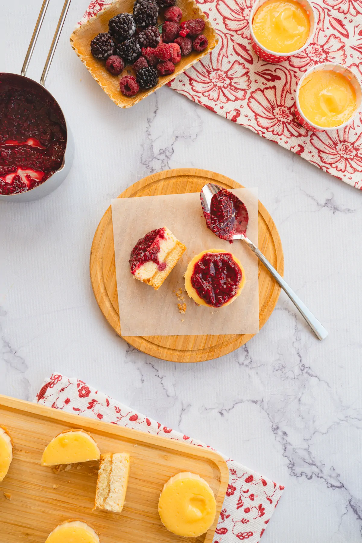 Mini cheesecake bites with a topping of keto-friendly raspberry jam.