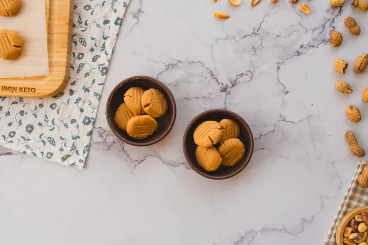 No-bake coconut cookies served in two ceramic bowls.