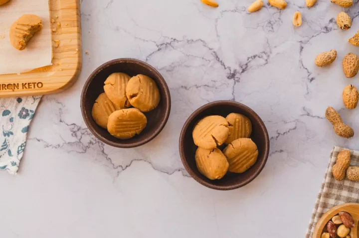 Ceramic bowls holding gluten-free and no-bake coconut cookies.