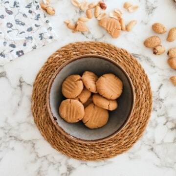 Homemade no-bake coconut cookies served in a ceramic bowl.