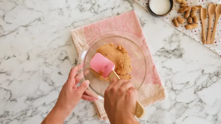 Mixing all the ingredients in a bowl until well combined and a dough forms.
