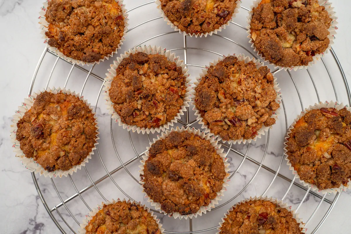 A top-to-bottom view of low-carb almond flour muffins amid other similar muffins.
