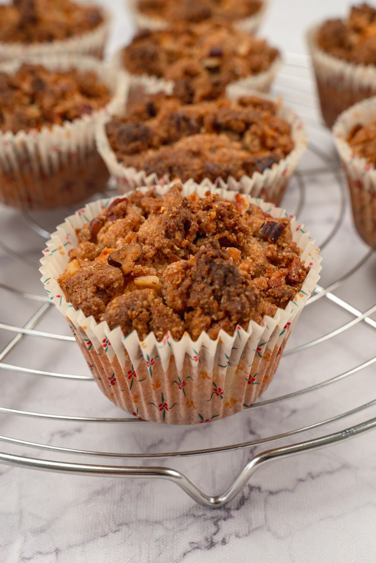 A close-up photo of homemade sugar-free almond flour muffins amid other similar muffins.