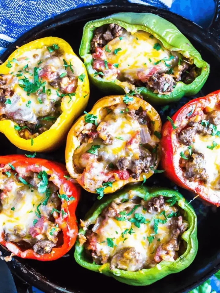 Keto Stuffed Peppers in a cast iron skillet