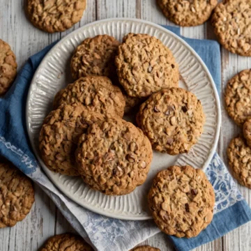 Keto oatmeal cookies on a white ceramic plate.