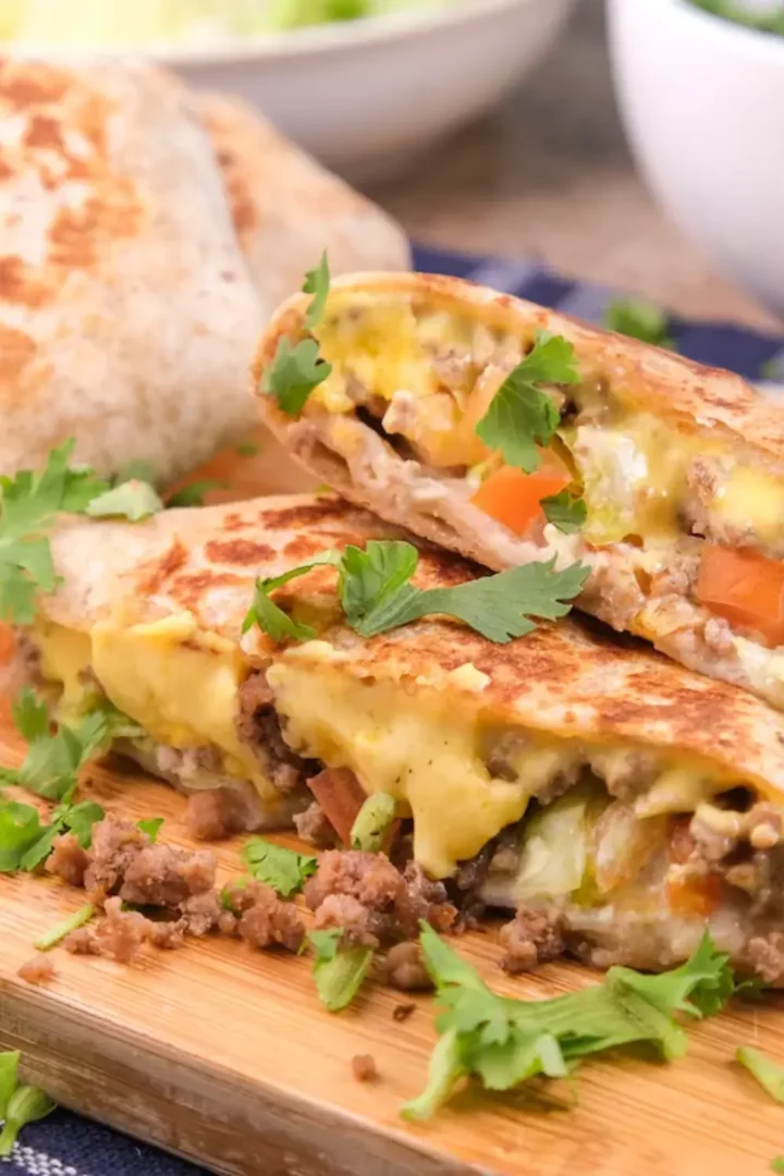 keto-friendly nacho cheese sauce by melting shredded cheese with heavy cream in the microwave.